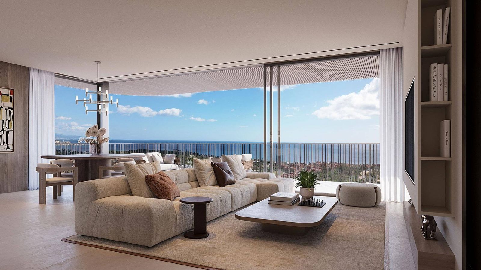 Luxe woonkamer in Nalu Suites met prachtig uitzicht op zee